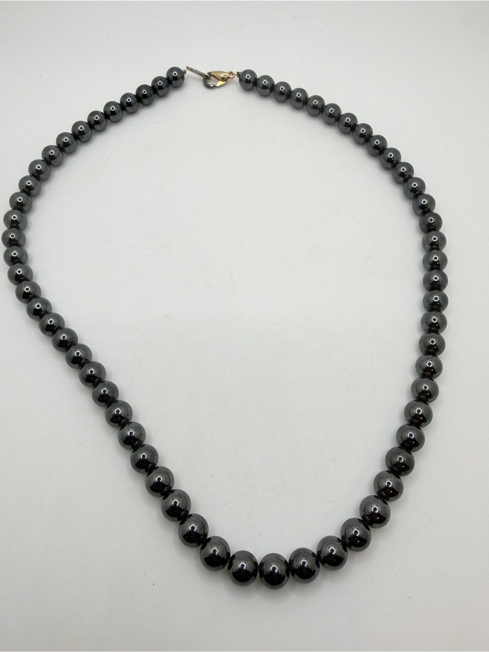 19" of solid 8mm HEMATITE necklace with gold tone metal hardware!